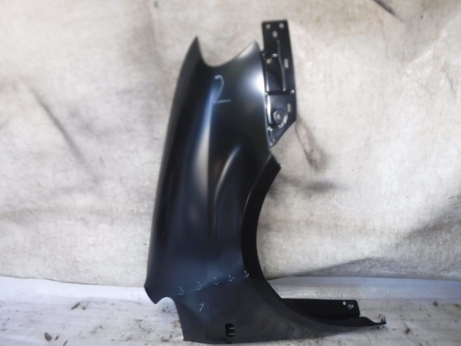 volkswagen caddy 04r- błotnik przód nowy prawy przedni z uszk