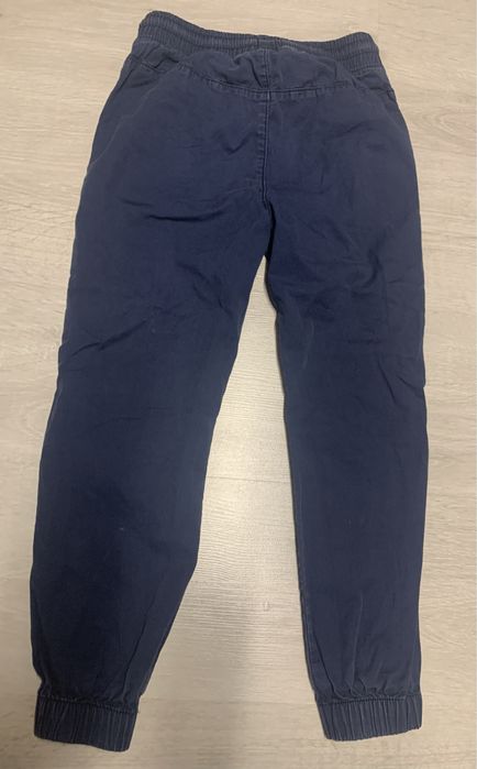 Granatowe joggery rozm 128 H&M