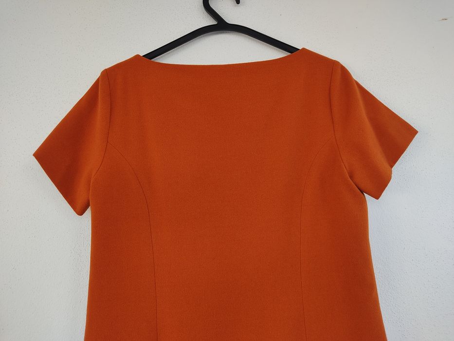 Vestido laranja, Globe