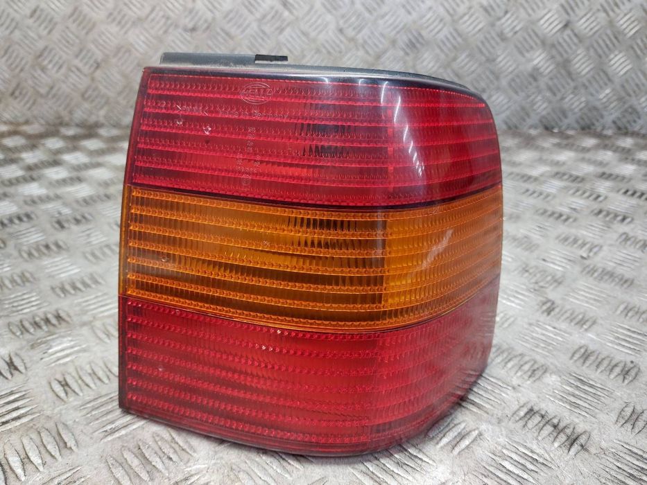 LAMPA PRAWY TYŁ HELLA VOLKSWAGEN PASSAT B4 SEDAN 3A5945112