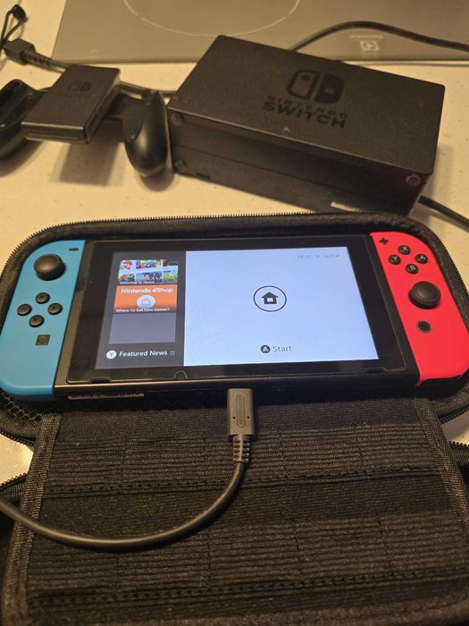 Konsola Nintendo Switch dodatki + 4gry