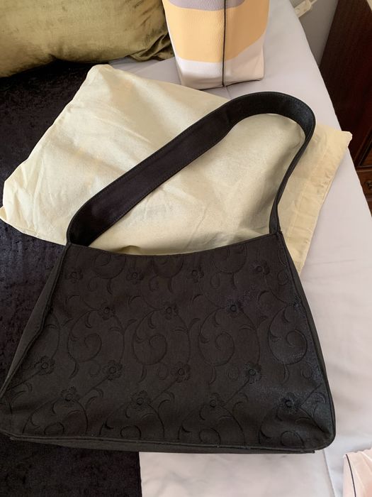 Mala de senhora usada