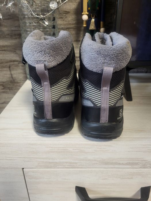 Продам зиние ботинки унисекс Salomon