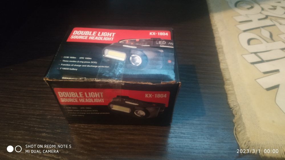 Налобний фонарик