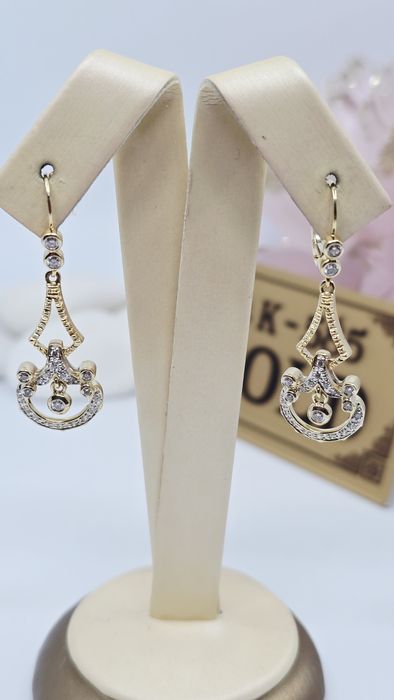 Złote kolczyki z diamentami próba 585 14k Używane Certyfikat