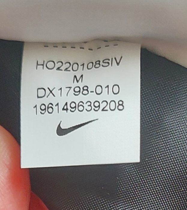 Жіночий пуховик nike