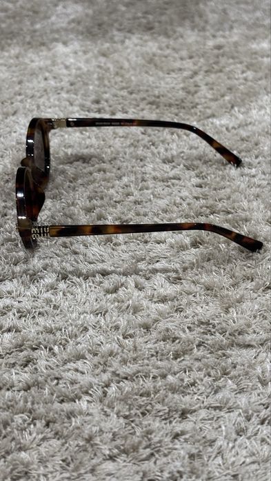 Oculos de sol da MiuMiu