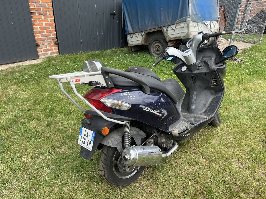 Kymco Grand Dink 125 na części czasza osłony gaźnik lusterka płozy