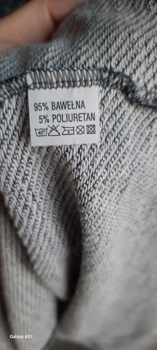 Dresowa asymetryczna  tunika z cekinową kieszenią