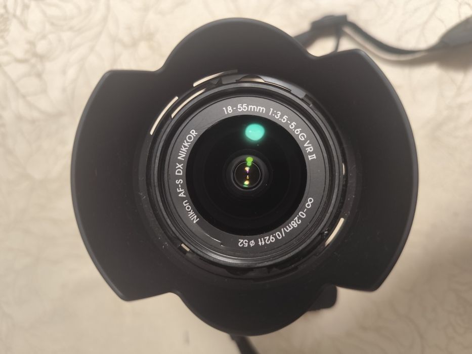 Nikon D5500 + 18–55 mm VR Lens + Storm-Proof Bag + Protective Cover64284487183491124