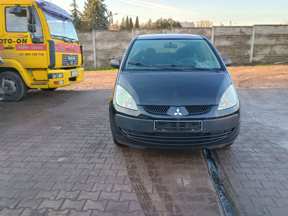 Zderzak przód tył maska drzwi klapa bagażnika blotnik Mitsubishi Colt
