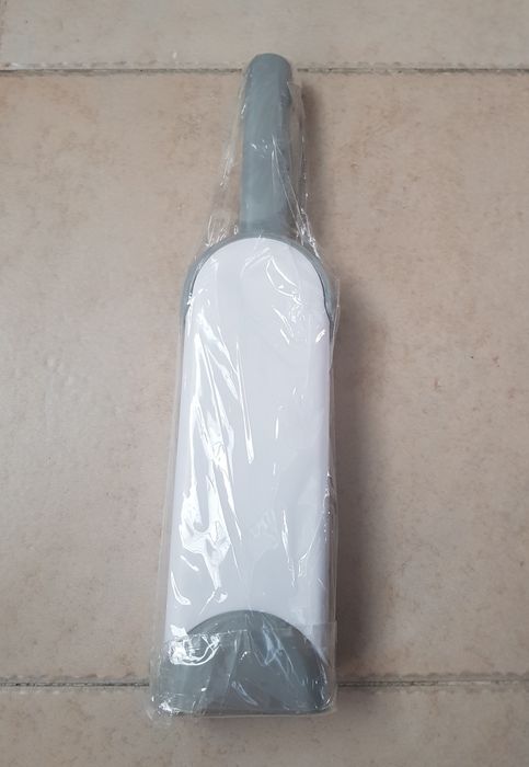 Escova para remover pêlos da roupa