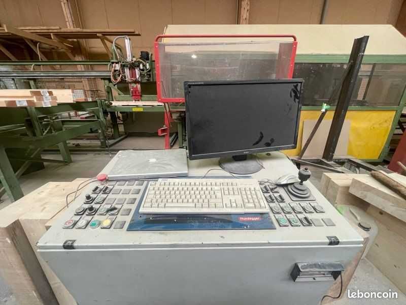 Linia ciesielska CNC Hundegger K1 centrum do więźby dachowej