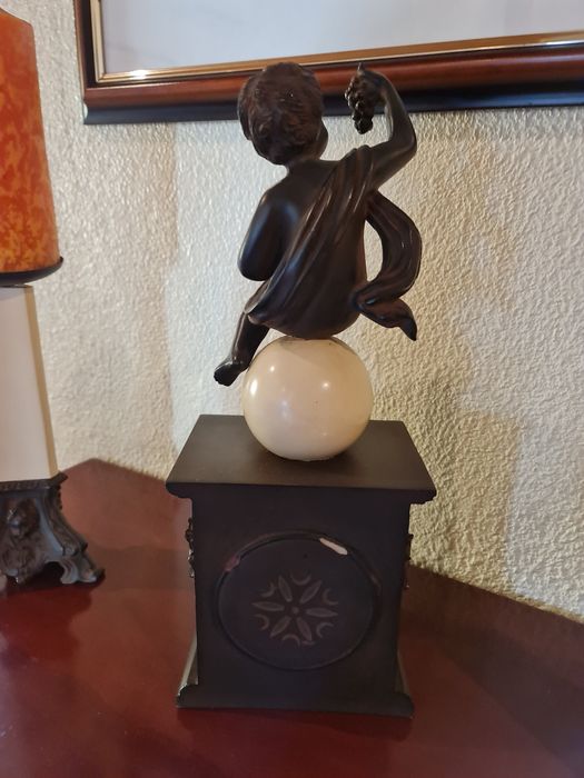 Conjunto relógio e candelabros