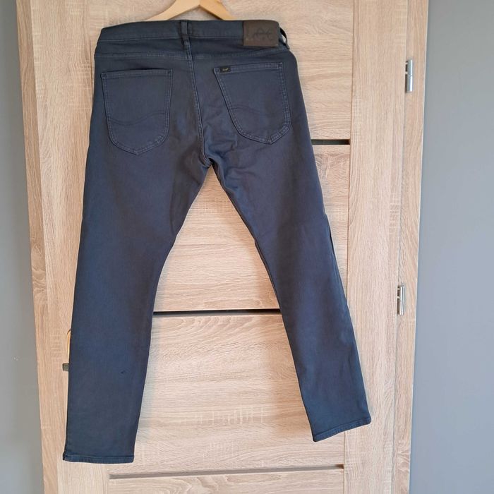 Granatowe jeansy Lee 32/30