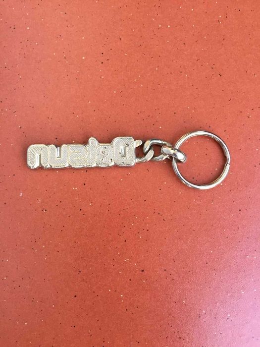 Chaveiro antigo de carro --- DATSUN