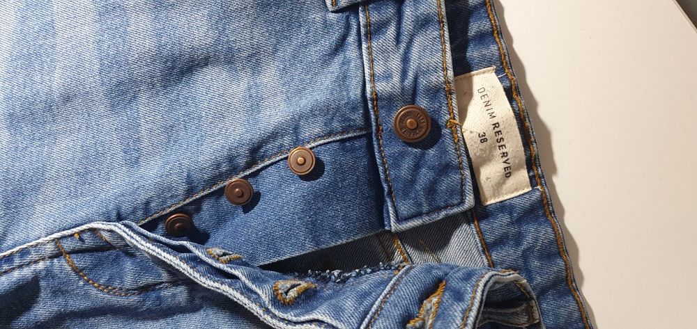 Spodnie jeans z rozdarciami