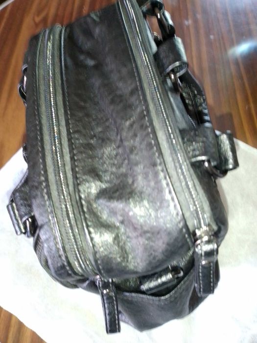 Carteira/ mochila de senhora nova