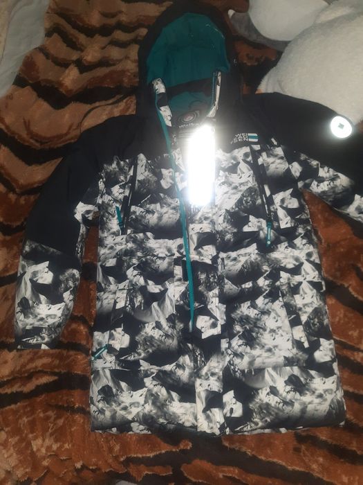 Зимова куртка на підлітка