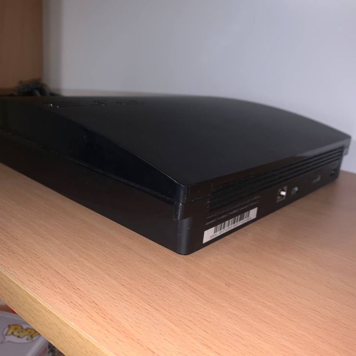 PlayStation 3 Slim 320 GB + геймпади + ігри