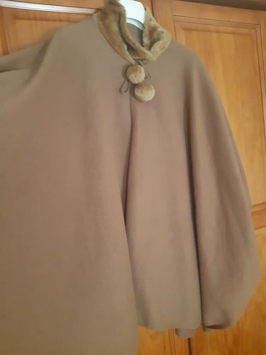 Poncho em castanho