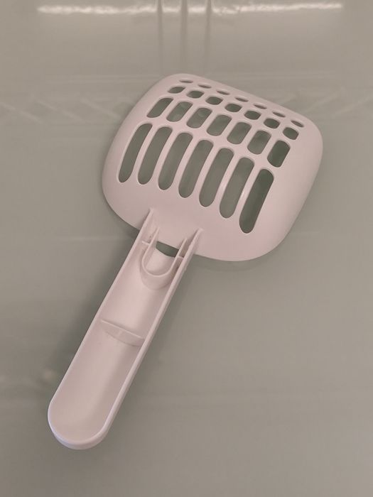 Pá para areia de gato