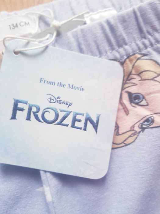 Nowe bawełniane legginsy dziewczęce marki Frozen rozmiar 134.