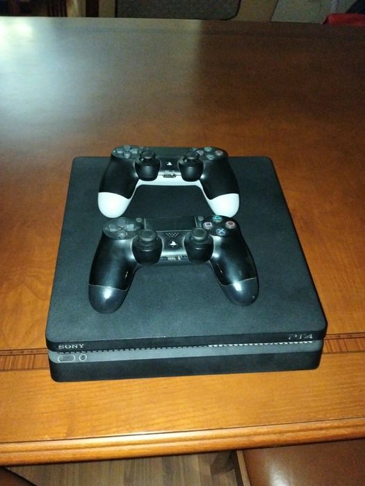 PS4 slim 500gb +2Comandos, Cabo HDMI e alimentação e oferta 2 jogos