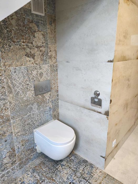 Usługi budowlane wykończenie wnętrz łazienki układanie płytek remont