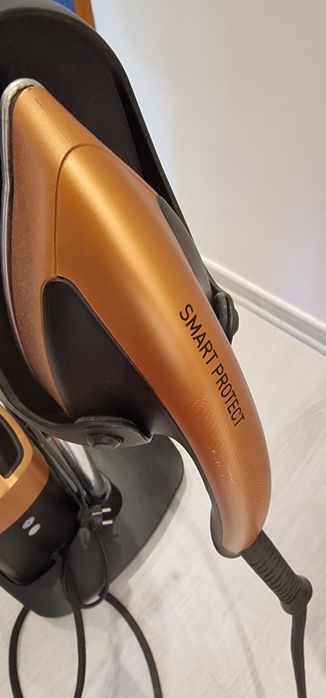 Ferro vertical a vapor Rowenta