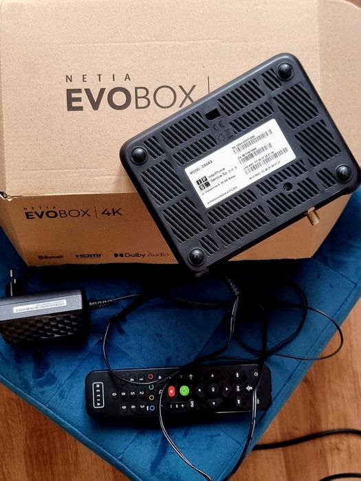 NOWY Dekoder Netia EvoBox 4K + pilot + zasilacz + pudełko