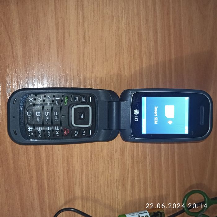 Мобільний телефон - разкладушка LG 450