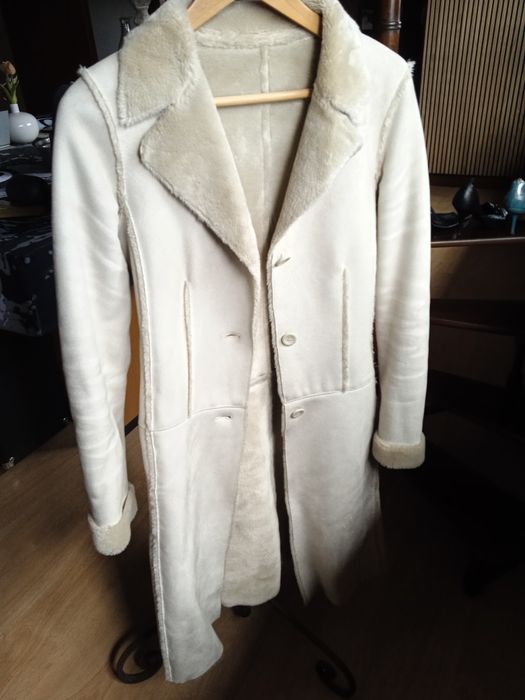 Belo casaco em pele de carneiro