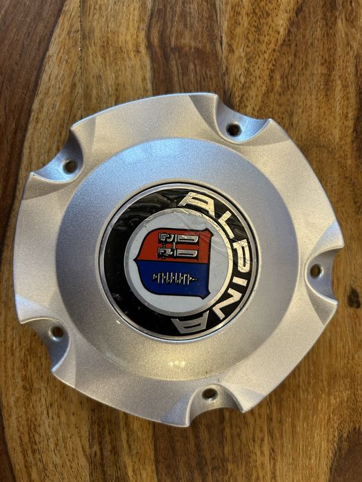 Dekielek emblemat nowy Alpina