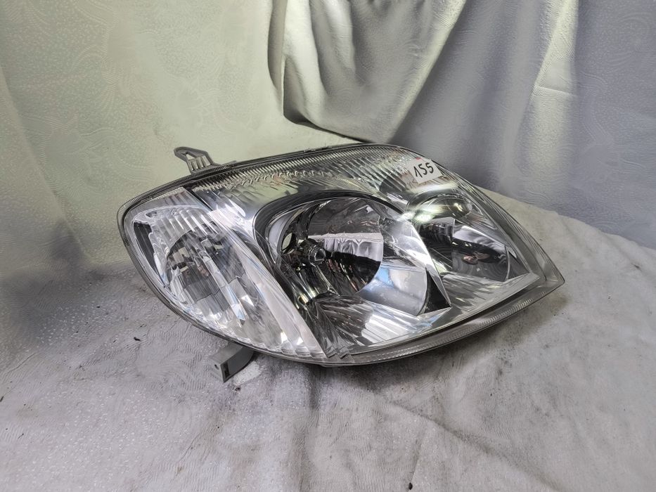 Lampa prawa Toyota Corolla e12 Europa reflektor przedni sprawna