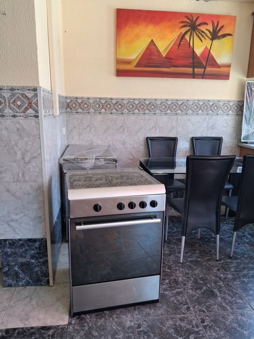 Fogão Meireles inox 4 a gás com forno a gás.