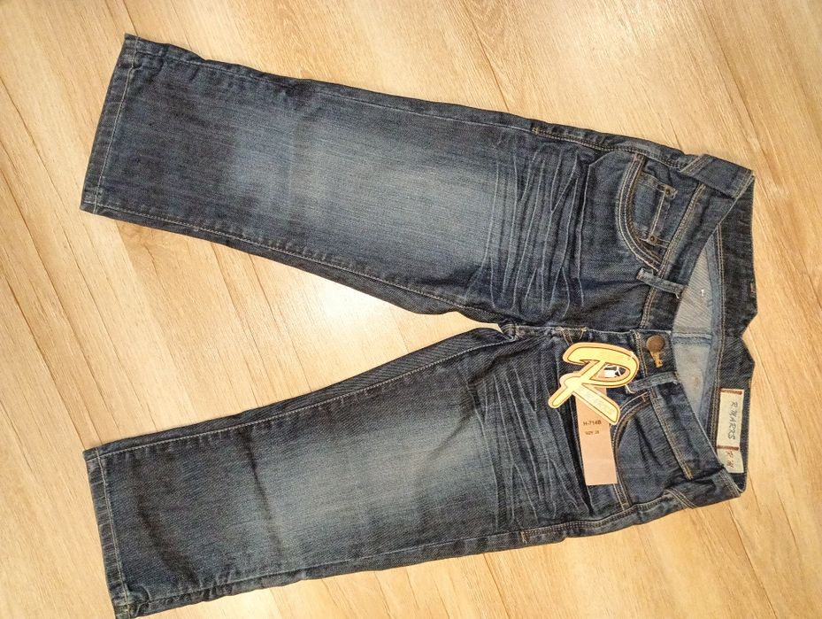 Spodnie nowe za kolano rozm 28