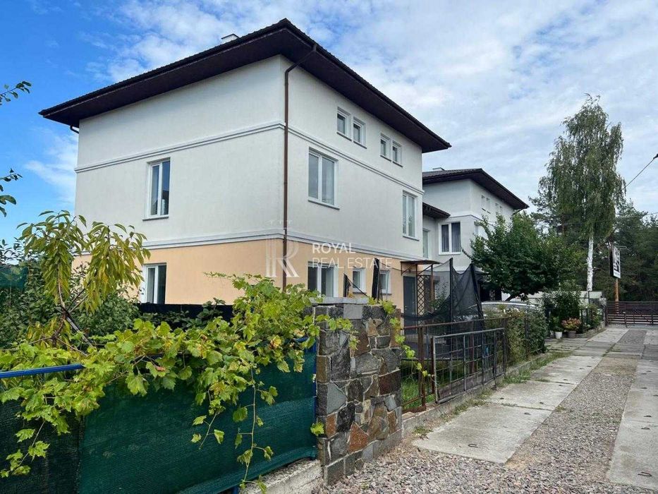 Продаж Дуплекс Гнідин 212 м² 5 кімнат 4 спальні 2 сотки Гараж Камін Тепла підлога Озеро 100 м