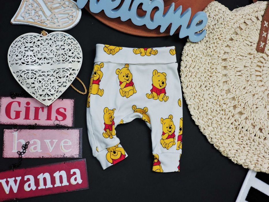 H&M - bawełniane spodnie buggy Kubuś Puchatek r 50