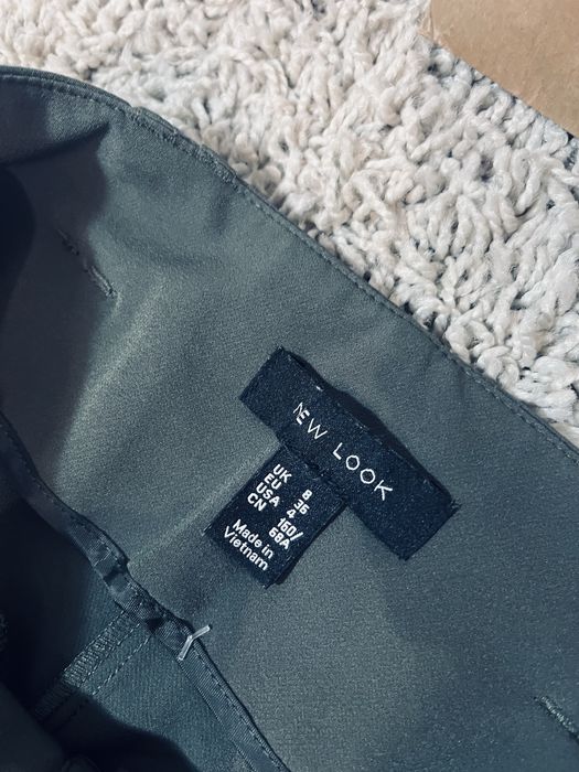 Ciemnozielone damskie spodnie s biurowe