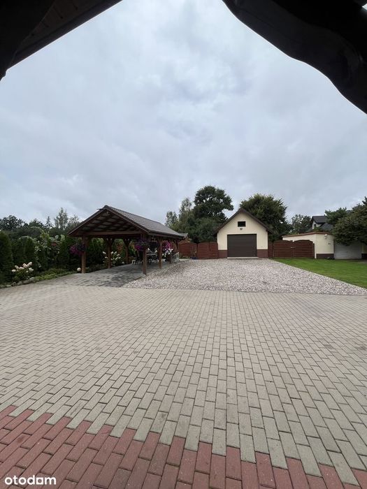 podwójny dom na Mazurach duża działka dwa garaże wiata
