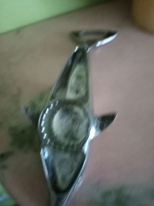 Stary otwieracz do butelek. Podwójny. Delfin
