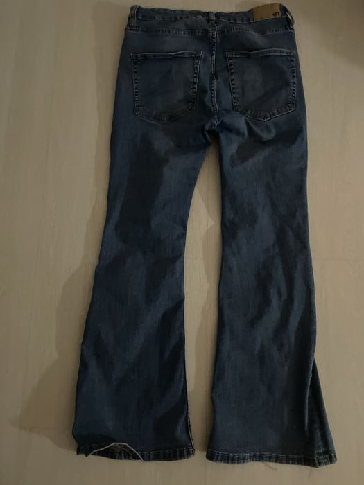 женские flared джинсы