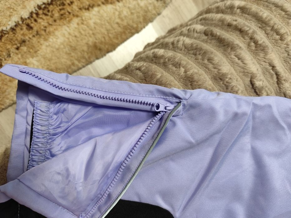 Продам,зимовий,непромокаючий дитячий напівкомбінезон.Розмір 116-122 см