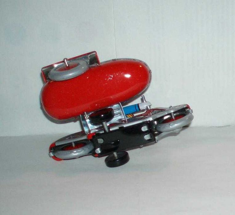 Новая коллекционная заводная игрушка мотоциклист ретро стиль жесть