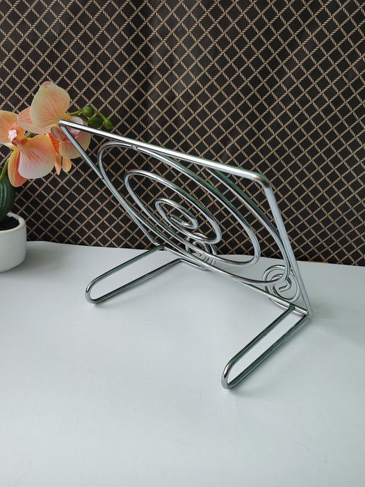 Вінтажна срібна металева підставка для книг