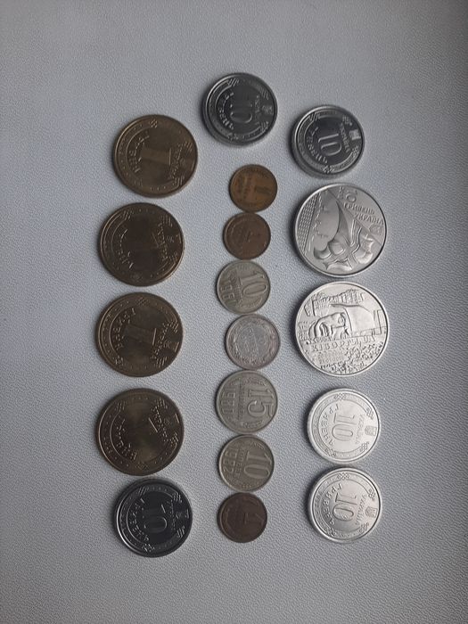 Монети.України та .