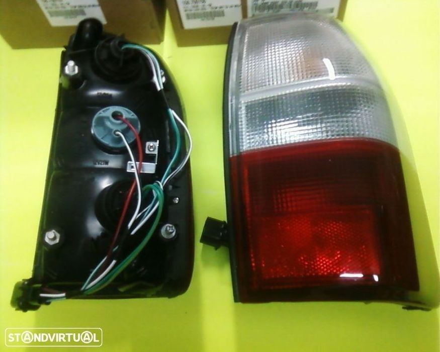 farolins stop mitsubishi l200 k74 strakar (novos)