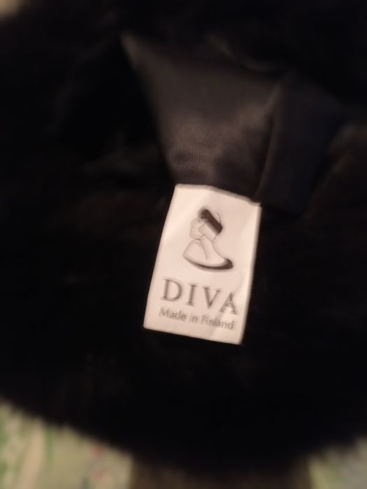 Кожаная шапка с мехом