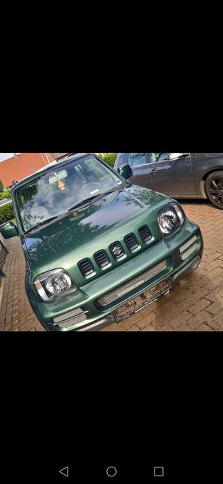 Suzuki Jimni 1.3 benz,super stan,hak,85 tys km